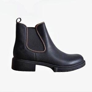 Coach Black Levy leather Chelsea boots featuring  gold studs and chunky lug sole
